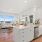 Kitchen and living room with water views