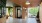 lobby with large tree and bookcase