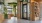 lobby with large tree and bookcase